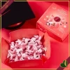 Confetti Maxtris Twist classici rossi con mandorla tostata e doppio cioccolato, in scatola e incartati singolarmente, 500 grammi