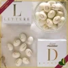 Confetti Maxtris Lettera T, bianchi con mandorla tostata, 200 grammi