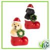 Cagnolino con Cappello Natalizio nella Calza in Resina – Altezza 12 cm, 2 modelli