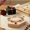 Bracciale “Platone” con cerchi in rodio anallergico e cristalli rossi effetto degradé con charm a cuore