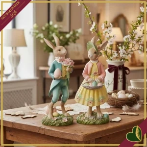 Coniglio e coniglietta decorativi in resina con uova, altezza 40–41 cm