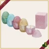 Candela uovo in vetro ambra sfaccettato, profumo Ginger & Warm Vanilla, altezza 12 cm