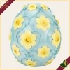 Uovo decorativo in resina blu con fiori gialli e luce LED, altezza 18 cm