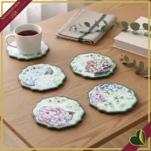 Set 4 sottobicchieri Flora con fiocco in ceramica e sughero, diametro 12 cm