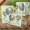 Vassoio Wonderland in melamina con mongolfiere acquerellate e manici integrati, lunghezza 35 cm