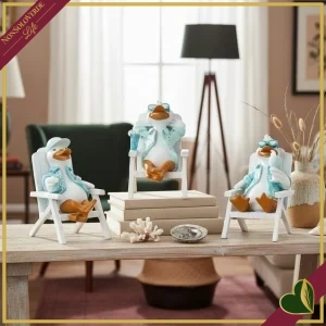 Papera decorativa Erich su sedia a sdraio, 3 modelli assortiti, altezza 10 cm