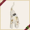 Elefante decorativo Midas avorio con dettagli dorati e argentati, altezza 25 cm