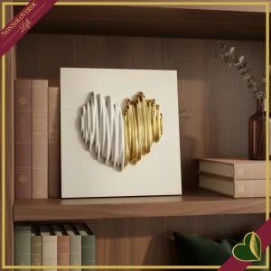 Quadro decorativo con cuore stilizzato 3D bianco e oro in marmorina, lunghezza 15 cm