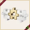 Scultura puzzle You Me in marmorina bianco e oro, lunghezza 18 cm