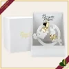 Scultura visi puzzle in cerchio in marmorina bianco e oro, altezza 29 cm