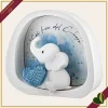 Decorazione luminosa con LED elefantino con cuore celeste in marmorina bianca, altezza 12 cm