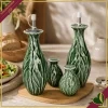 Set menage Foglia Vegan da 4 pezzi in porcellana verde con base in bamboo naturale, altezza 22 cm