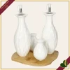 Menage Foglia Vegan set 4 pezzi in porcellana bianco con base in bamboo naturale, altezza 22 cm