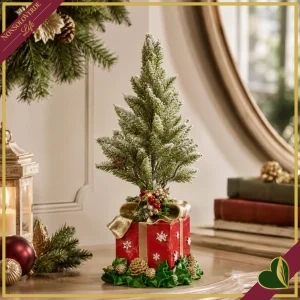 Alberello natalizio innevato in resina su pacco regalo rosso con fiocco oro, altezza 47 cm