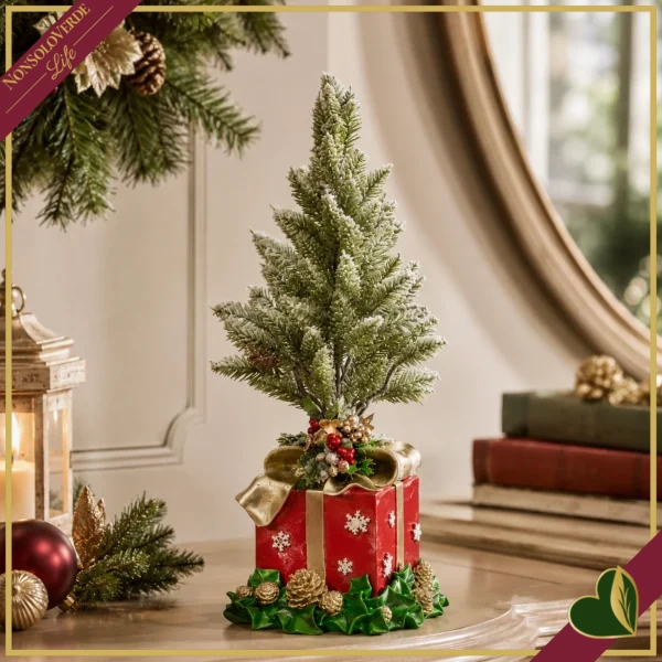 Alberello natalizio innevato in resina su pacco regalo rosso con fiocco oro, altezza 47 cm