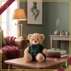Orsacchiotto in peluche beige con completo verde e dettagli tartan blu, altezza 20 cm