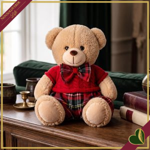 Orsacchiotto in peluche beige con completo rosso e dettagli tartan, altezza 20 cm