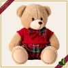 Orsacchiotto in peluche beige con completo rosso e dettagli tartan, altezza 30 cm